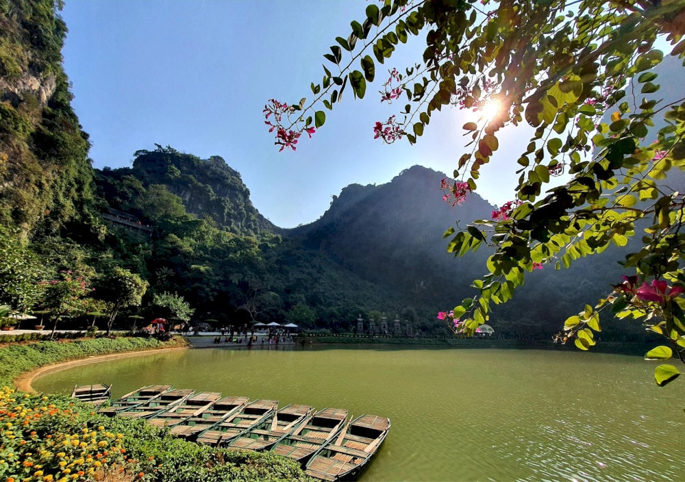 Visitors can stroll along the stone paths circling the lake